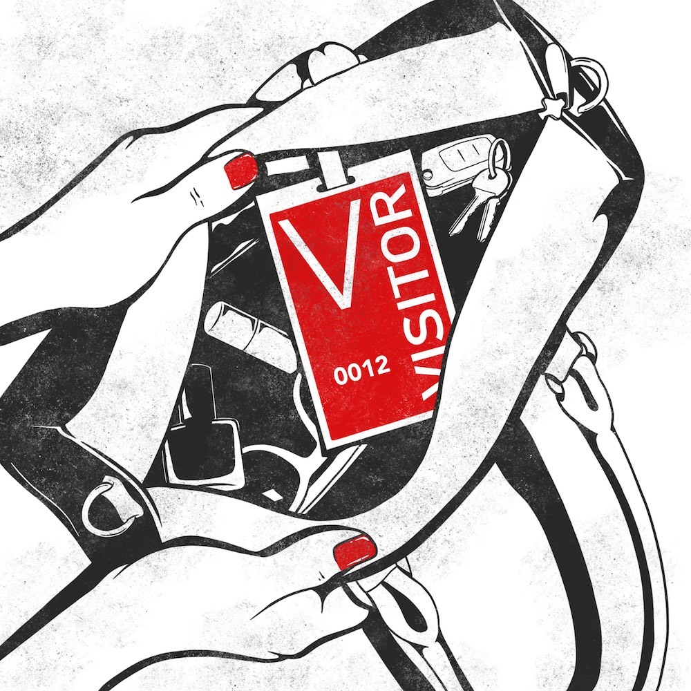 Visitor badge in a purse