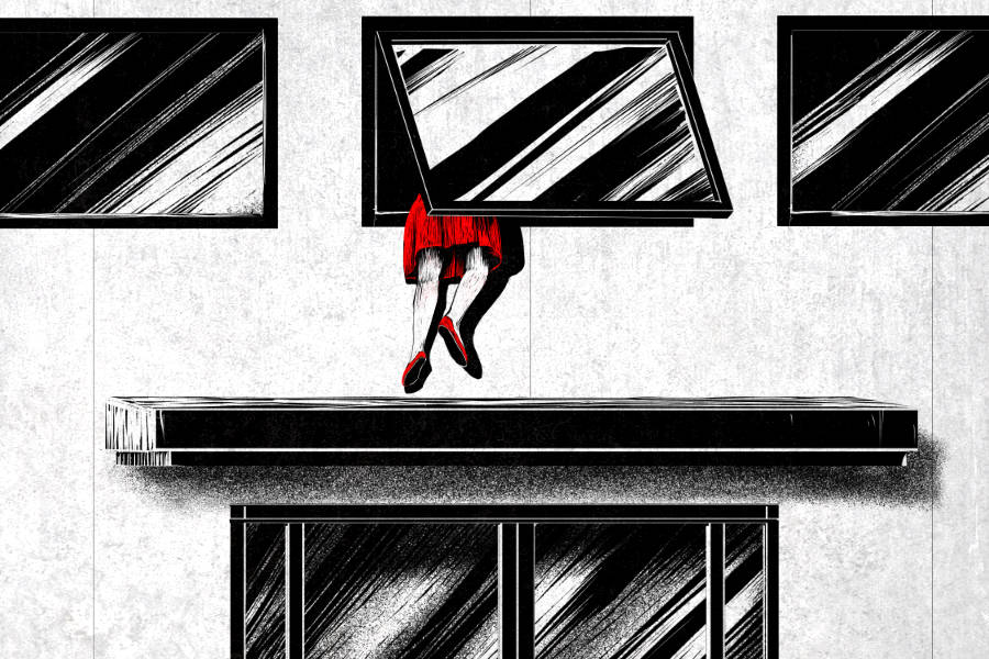 A woman climbing in through a window.